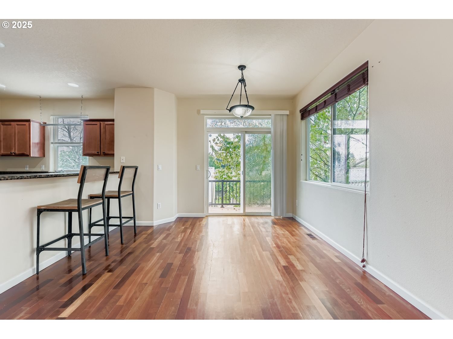 7912 Northeast Klickitat Street Portland, OR 97213 - Photo 8 of 29 a view of a livingroom with furniture window and wooden floor
