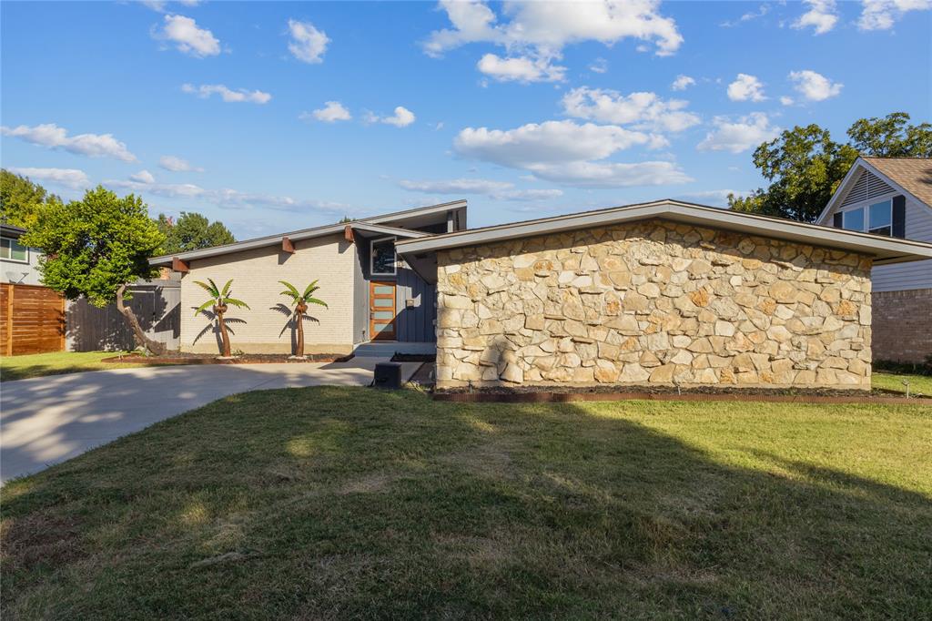 12218 Treeview Lane Farmers Branch, TX 75234 - Photo 4 of 17 a view of an outdoor space and yard