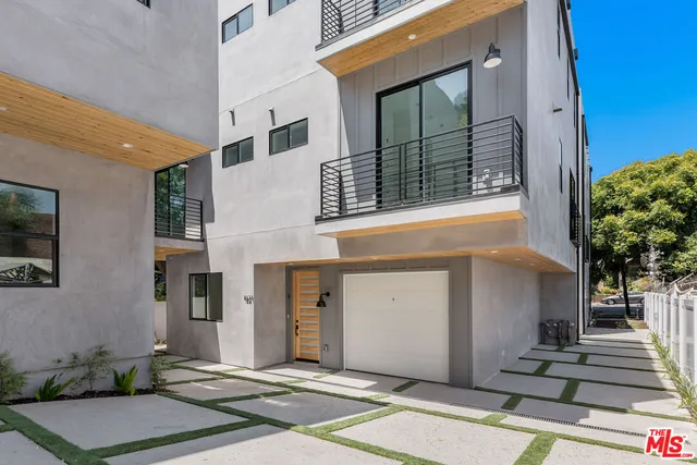 a front view of a house with windows