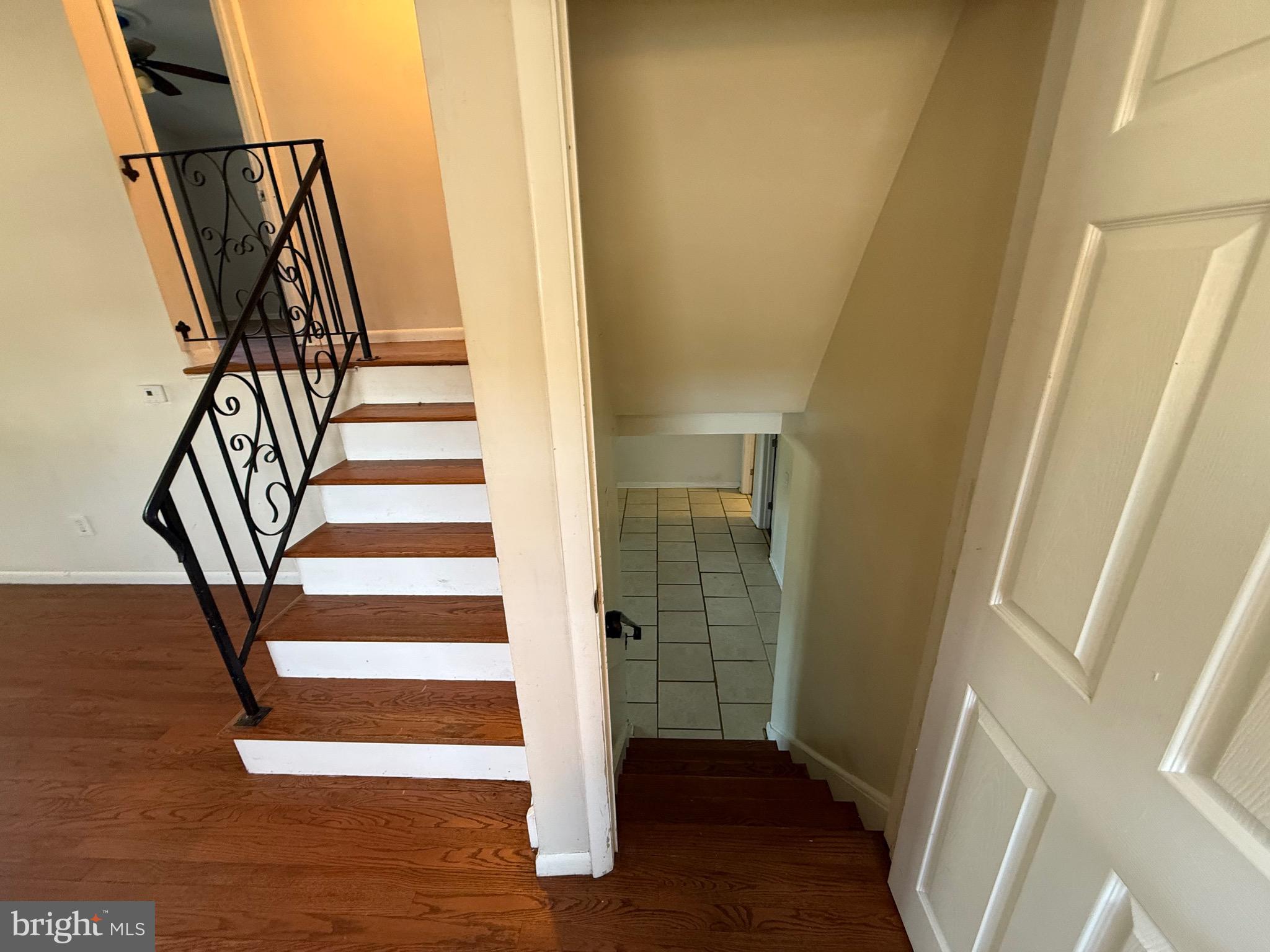 174 Kansas Road Pennsville, NJ 08070 - Photo 13 of 22 a view of entryway with wooden floor and stairs