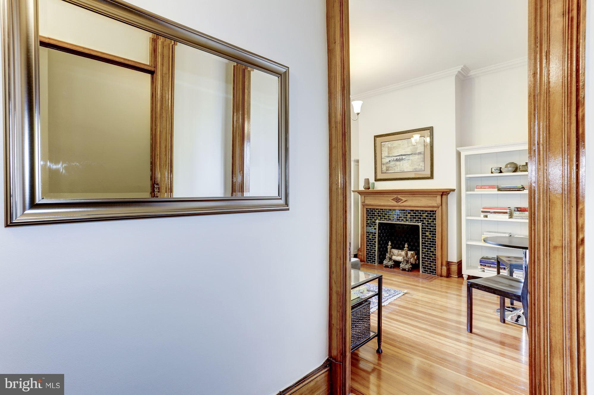 2220 20th Street Northwest, Unit 57 Washington, DC 20009 - Photo 6 of 27 a view of a livingroom with furniture and a fireplace