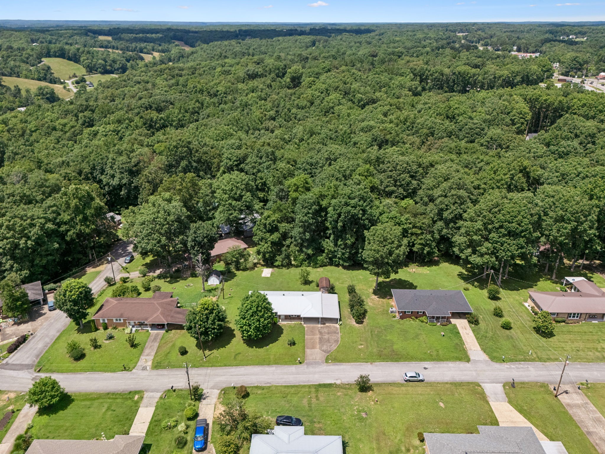 708 Hickory Street Centerville, TN 37033 - Photo 38 of 57 an aerial view of a house with a yard