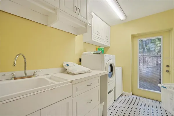 a bathroom with a sink and a shower