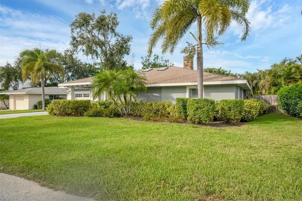 a view of a house with a garden