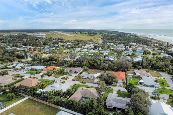an aerial view of residential house with outdoor space