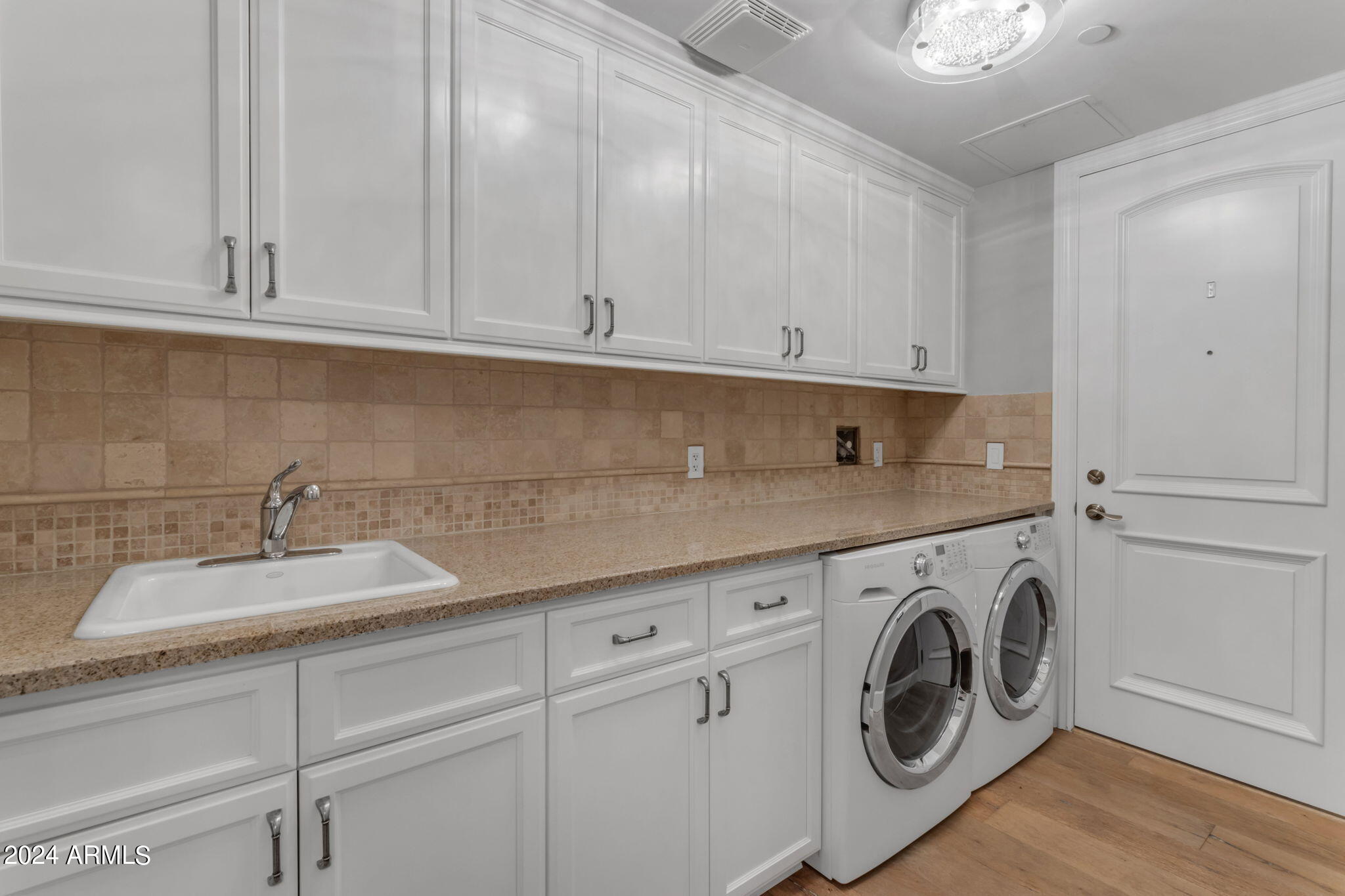 7181 East Camelback Road, Unit 704 Scottsdale, AZ 85251 - Photo 40 of 96 Laundry room w/sink