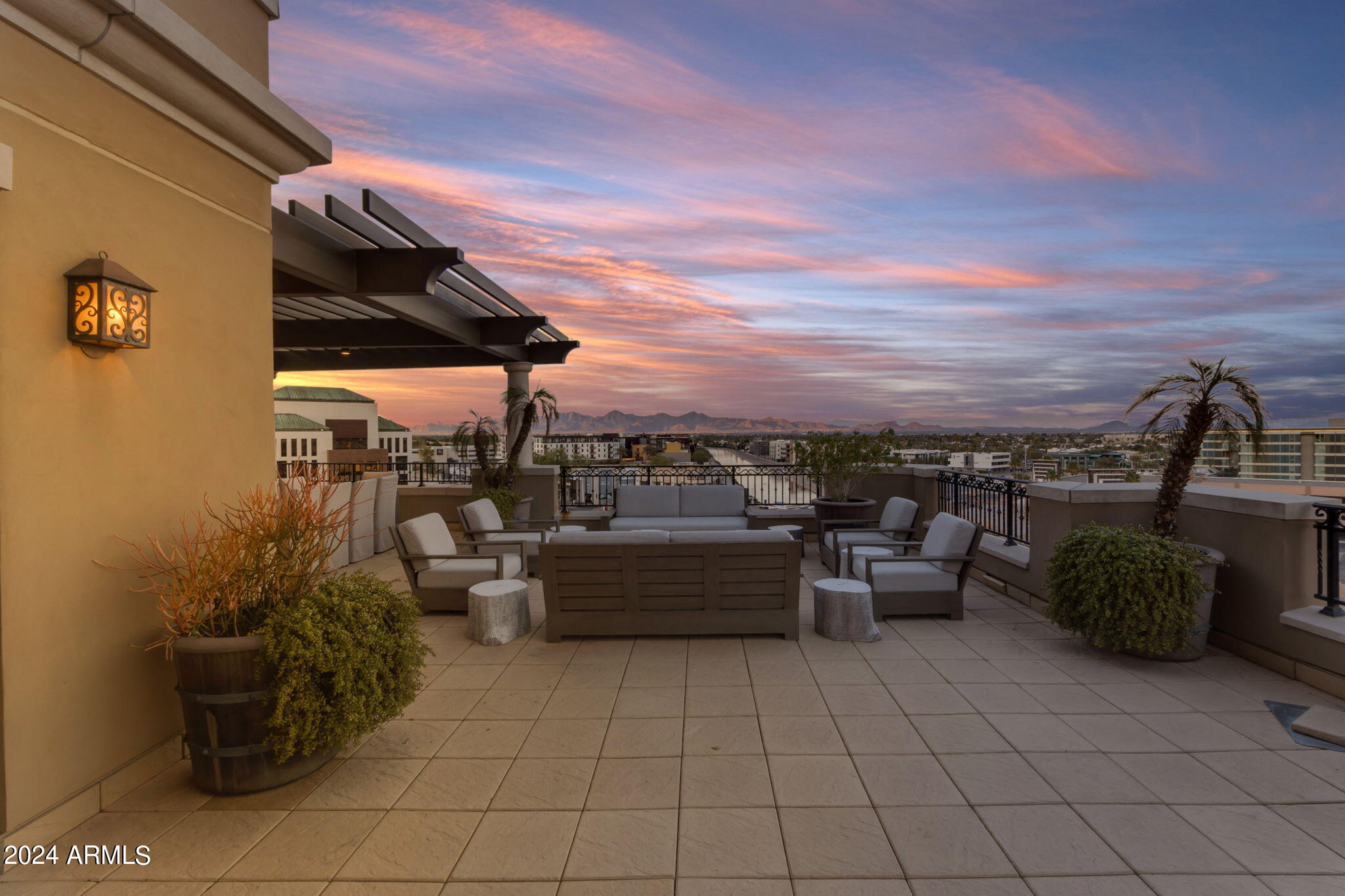 7181 East Camelback Road, Unit 704 Scottsdale, AZ 85251 - Photo 78 of 96 Patio at sunset