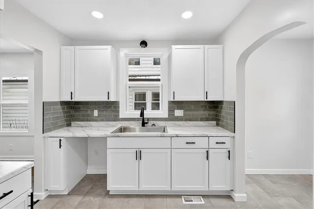 $385,000 | 7520 Grand Avenue, Kansas City, MO 64114