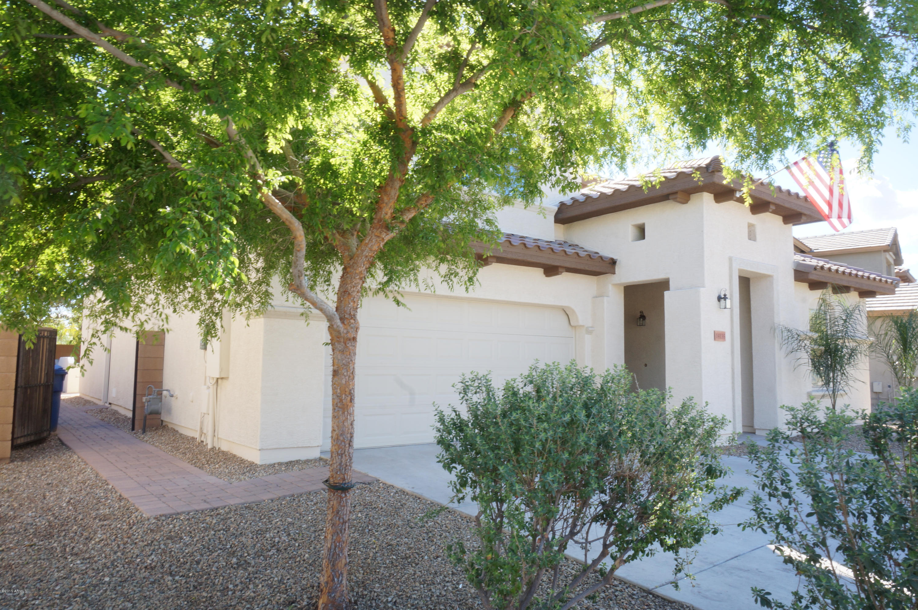 14135 West Calavar Road Surprise, AZ 85379 - Photo 54 of 54 shady front yard