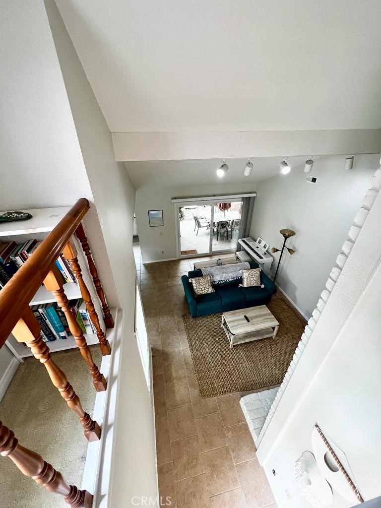 803 Caminito Azul Carlsbad, CA 92011 - Photo 31 of 44 a living room with furniture and a wooden floor