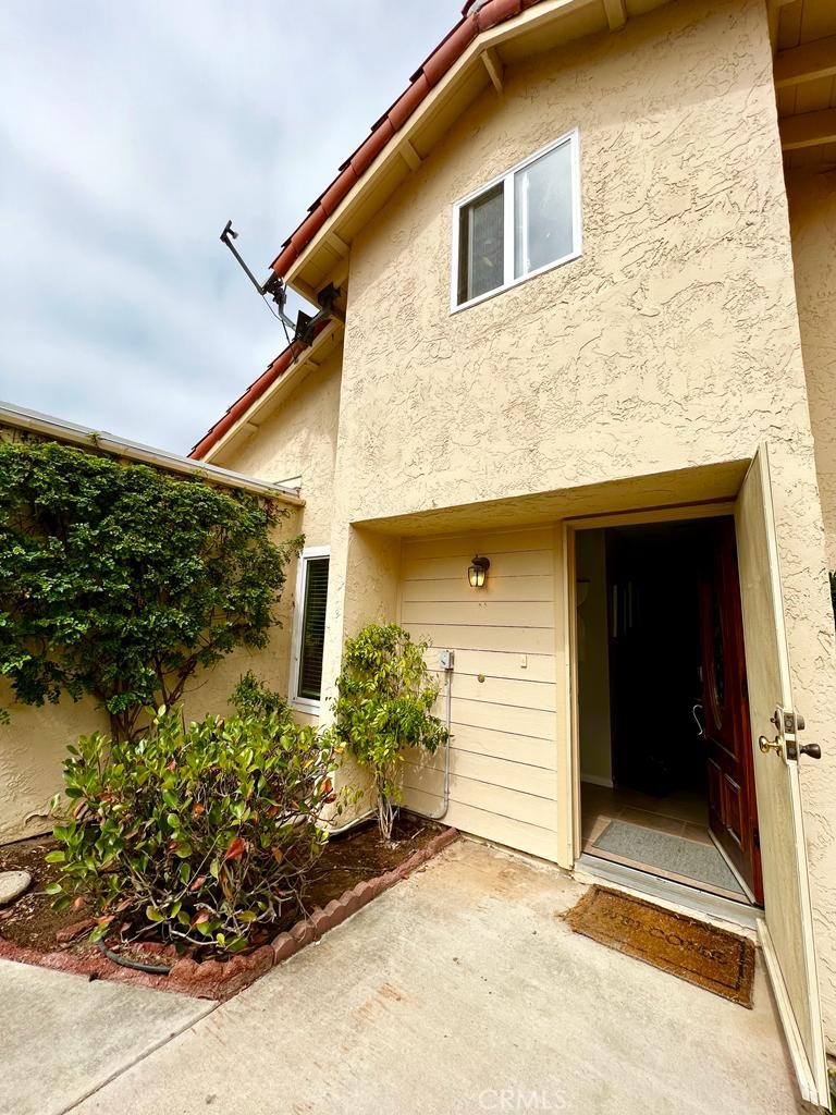 803 Caminito Azul Carlsbad, CA 92011 - Photo 44 of 44 a front view of a house with a yard