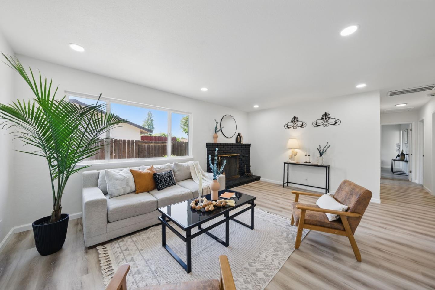 1693 Greentree Drive Concord, CA 94521 - Photo 11 of 40 a living room with furniture and a wooden floor