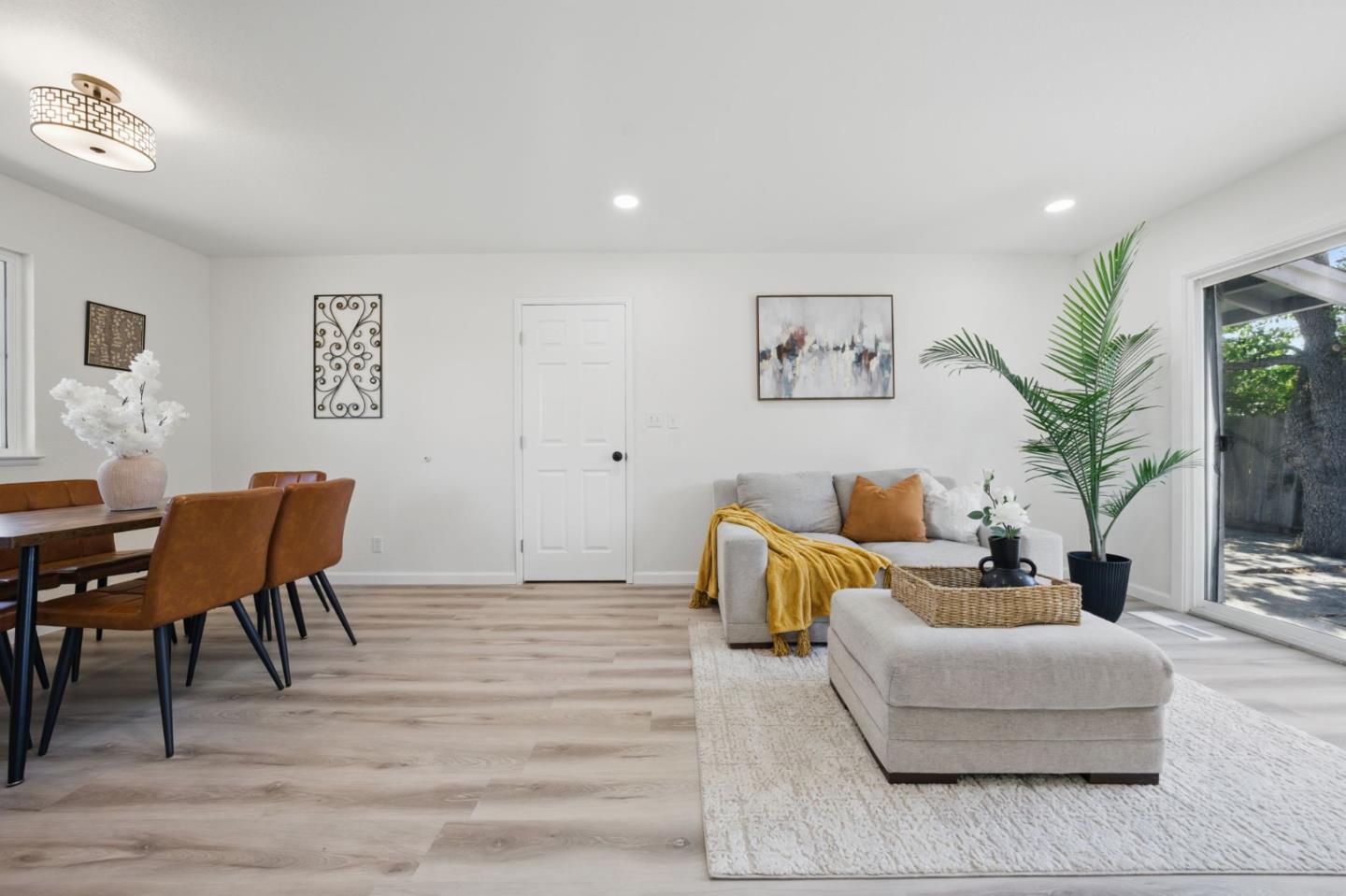 1693 Greentree Drive Concord, CA 94521 - Photo 12 of 40 a living room with furniture and a potted plant