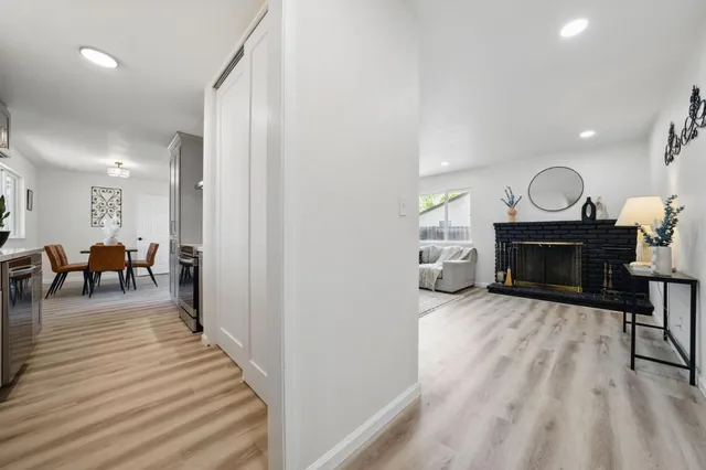a bathroom with a toilet and a shower curtain