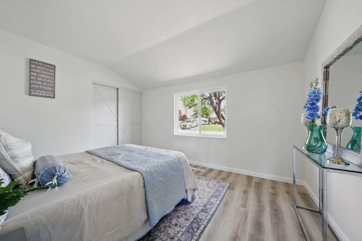 1693 Greentree Drive Concord, CA 94521 - Photo 20 of 40 a bedroom with a bed table and a window