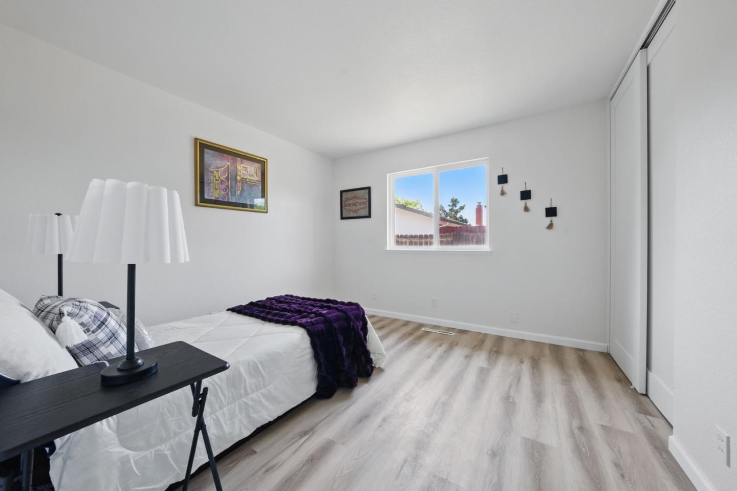 1693 Greentree Drive Concord, CA 94521 - Photo 22 of 40 a bedroom with a bed and a table