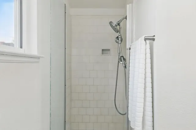 a view of an empty room with a garage