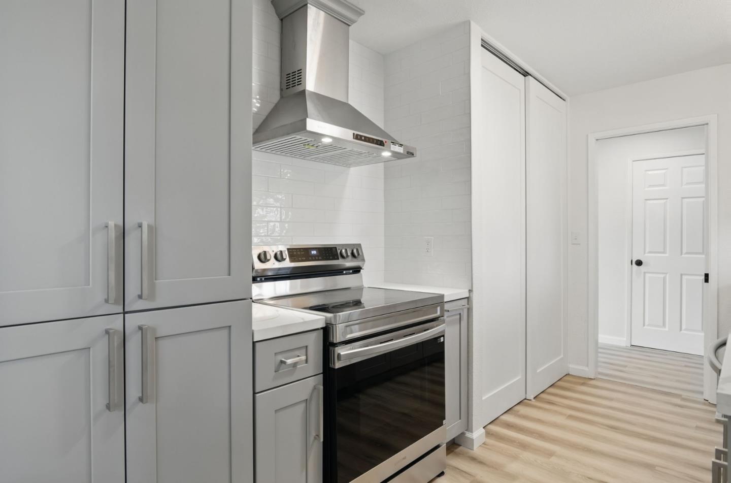 1693 Greentree Drive Concord, CA 94521 - Photo 4 of 40 a kitchen with a stove and a refrigerator