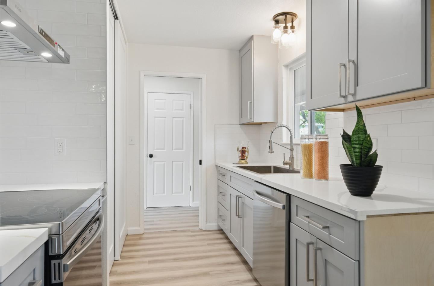 1693 Greentree Drive Concord, CA 94521 - Photo 5 of 40 a kitchen with a sink and cabinets