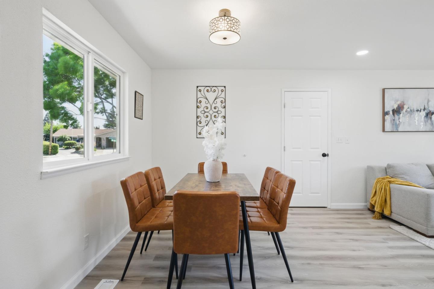 1693 Greentree Drive Concord, CA 94521 - Photo 6 of 40 a dining room with furniture and wooden floor