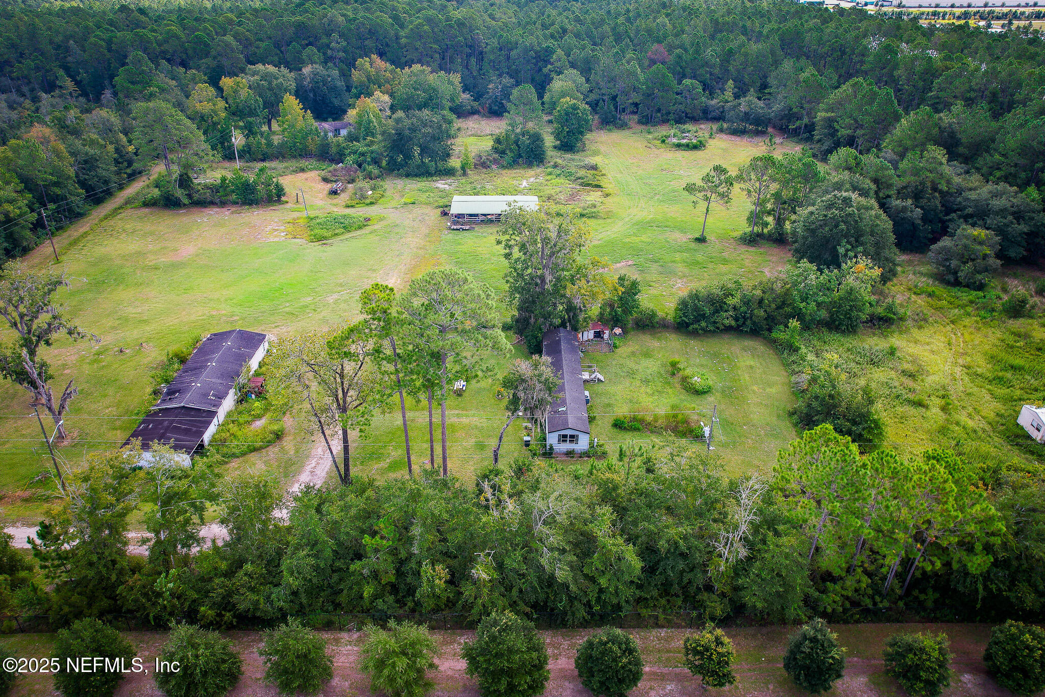 3821 Alcoy Road Jacksonville, FL 32221 - Photo 19 of 23 an aerial view of a residential houses with outdoor space and trees all around
