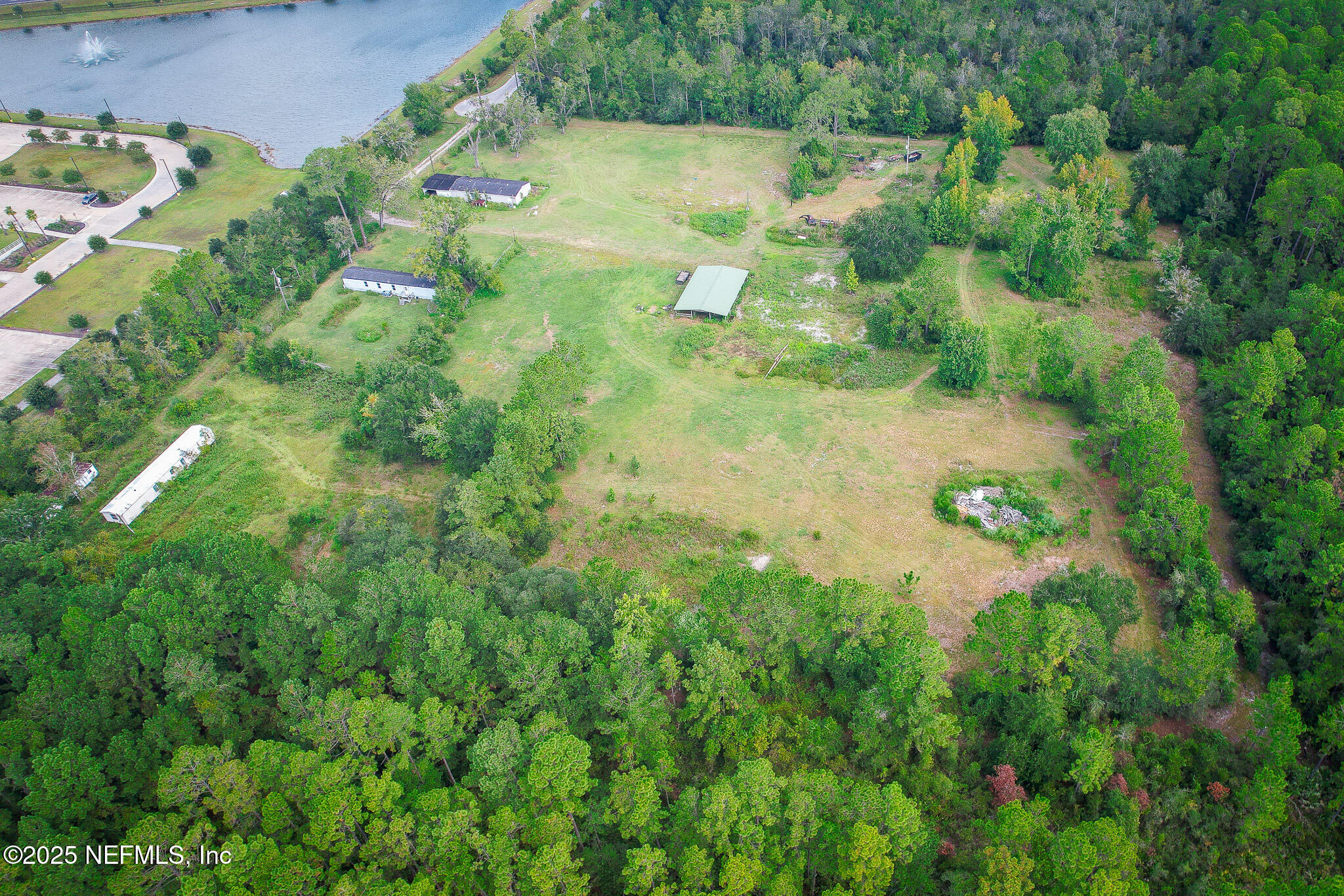 3821 Alcoy Road Jacksonville, FL 32221 - Photo 23 of 23 a view of a garden with a house
