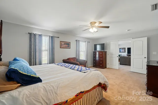 a bathroom with a sink vanity and a mirror