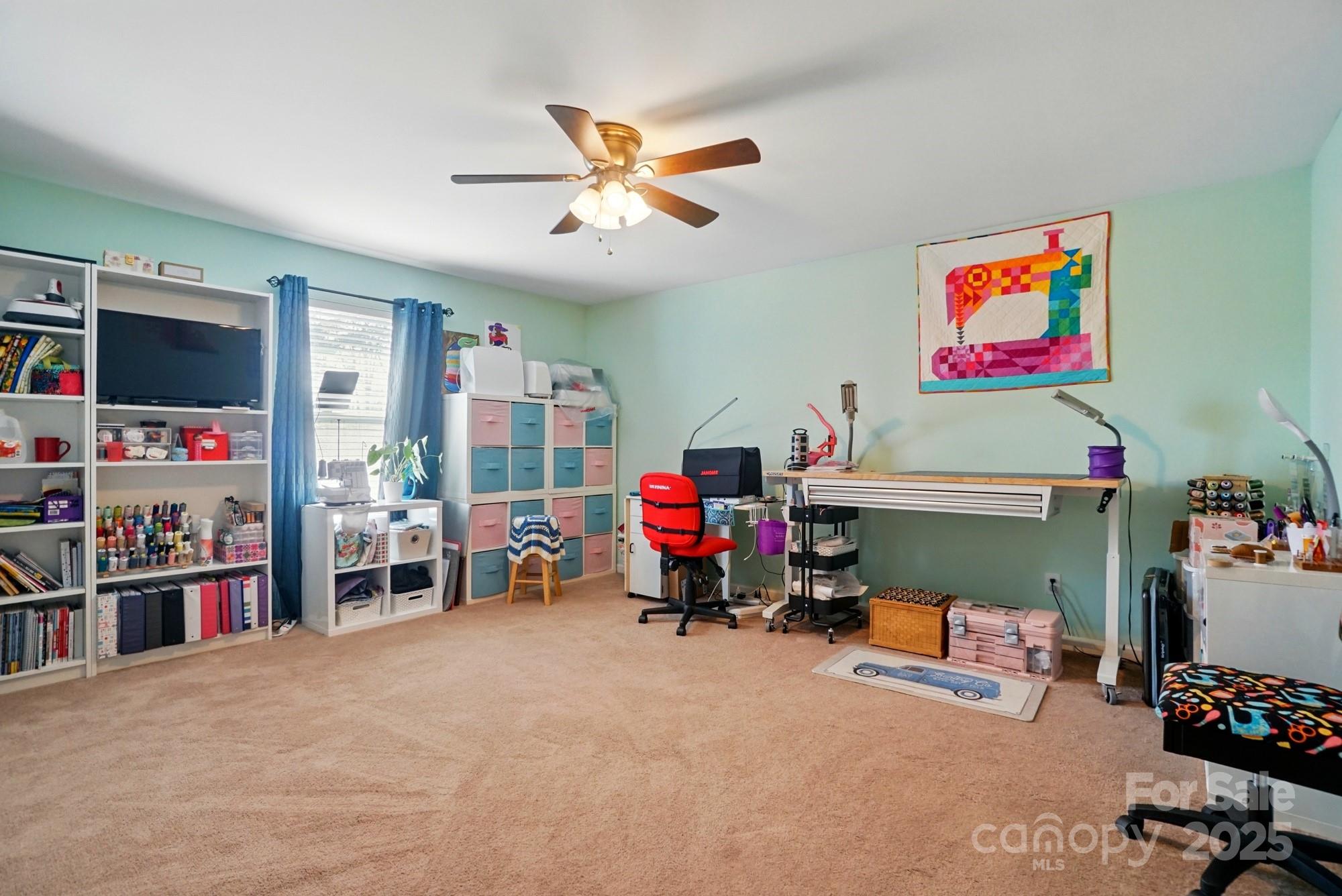 3272 Saddlebrook Drive Midland, NC 28107 - Photo 35 of 44 a living room with furniture and a flat screen tv