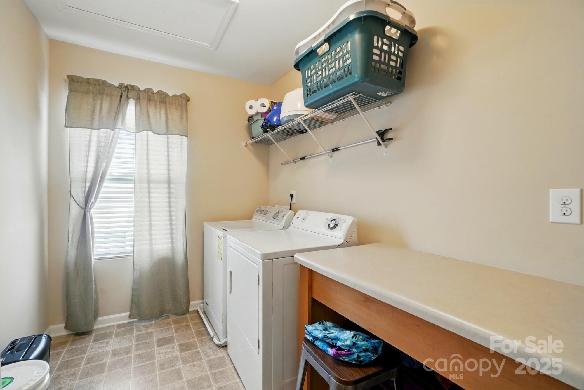 3272 Saddlebrook Drive Midland, NC 28107 - Photo 38 of 44 a utility room with dryer and washer