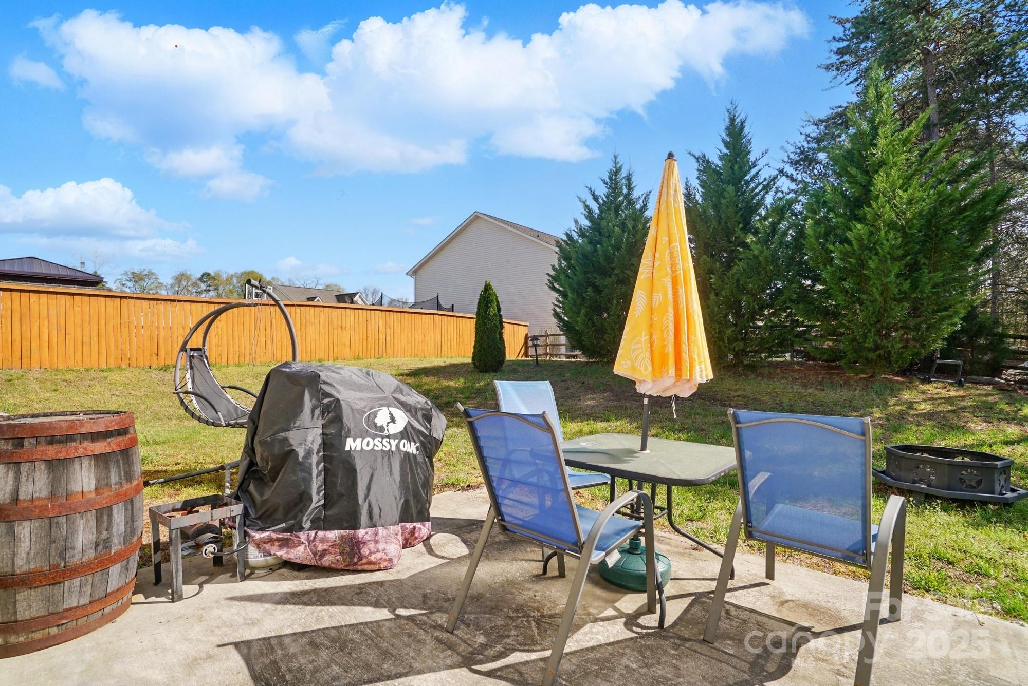 3272 Saddlebrook Drive Midland, NC 28107 - Photo 39 of 44 a view of a chairs and table in patio