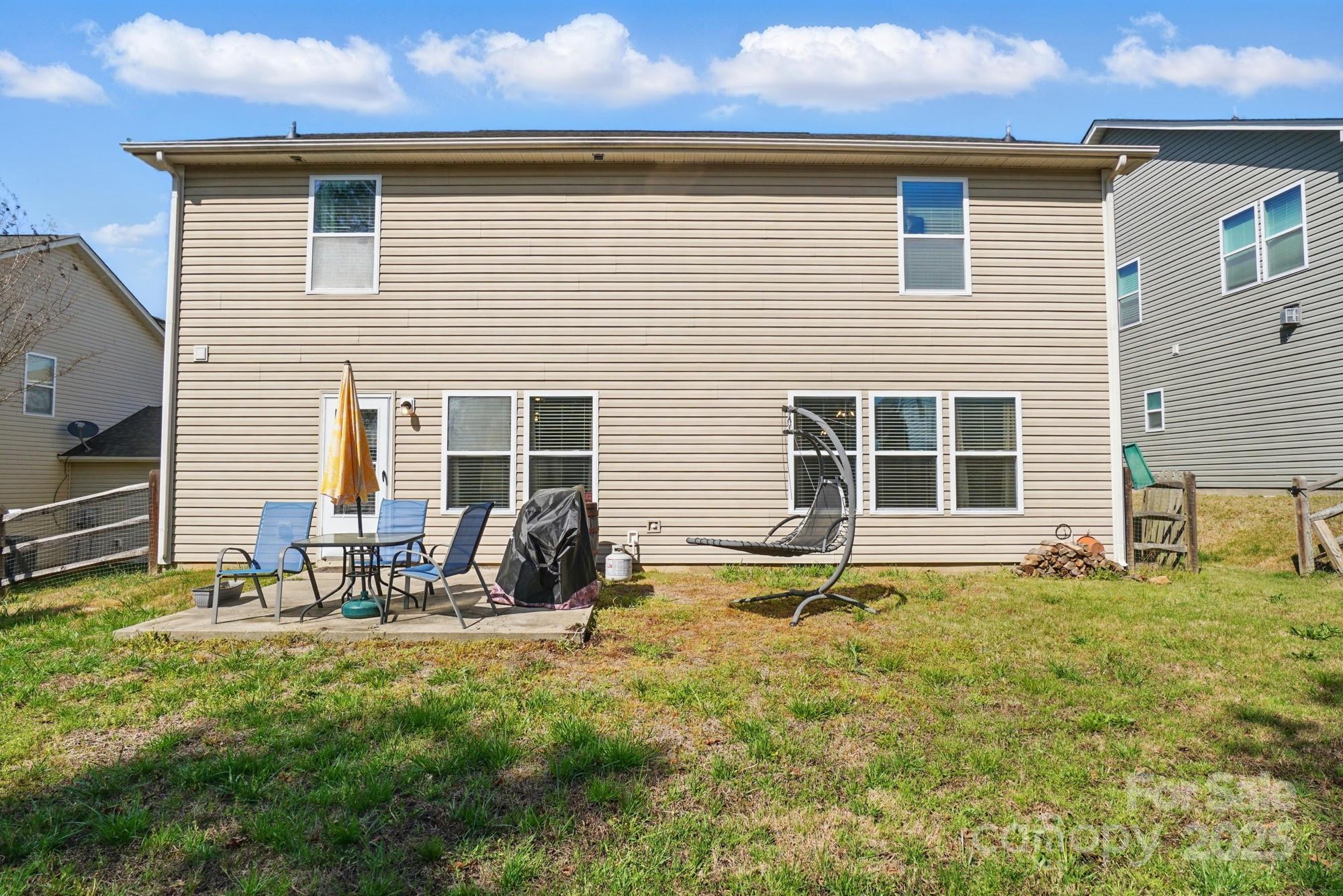 3272 Saddlebrook Drive Midland, NC 28107 - Photo 41 of 44 a front view of a house with patio