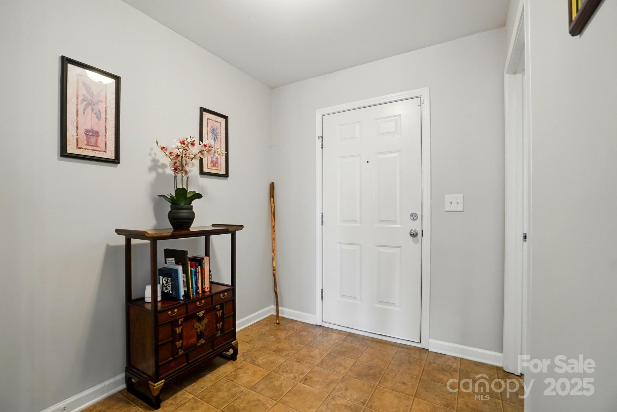 3272 Saddlebrook Drive Midland, NC 28107 - Photo 5 of 44 a view of an entryway with wooden floor