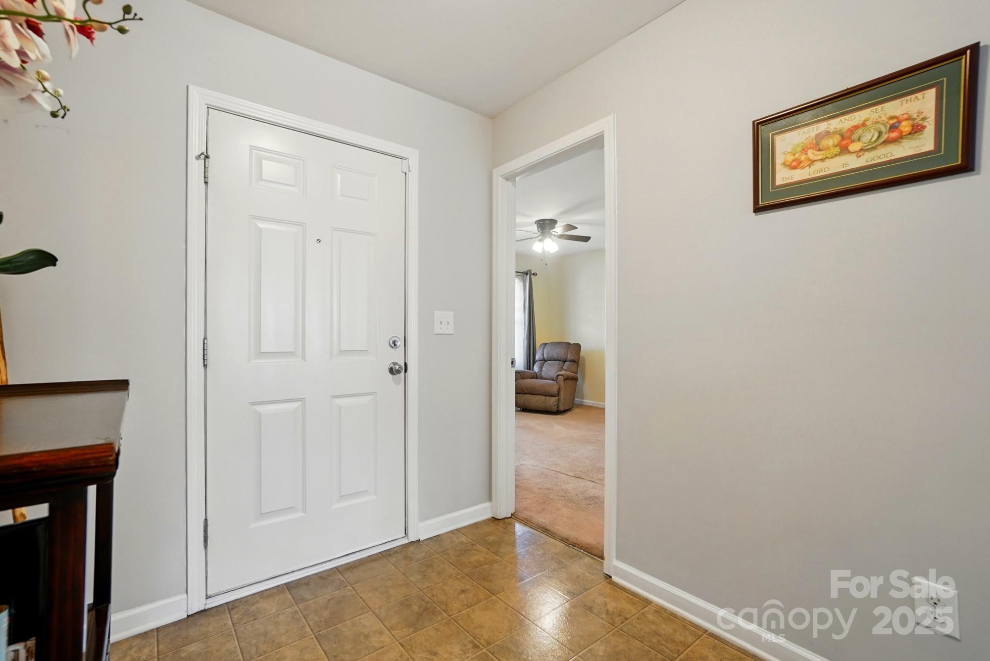 3272 Saddlebrook Drive Midland, NC 28107 - Photo 6 of 44 a view of a hallway with closet and a bathroom