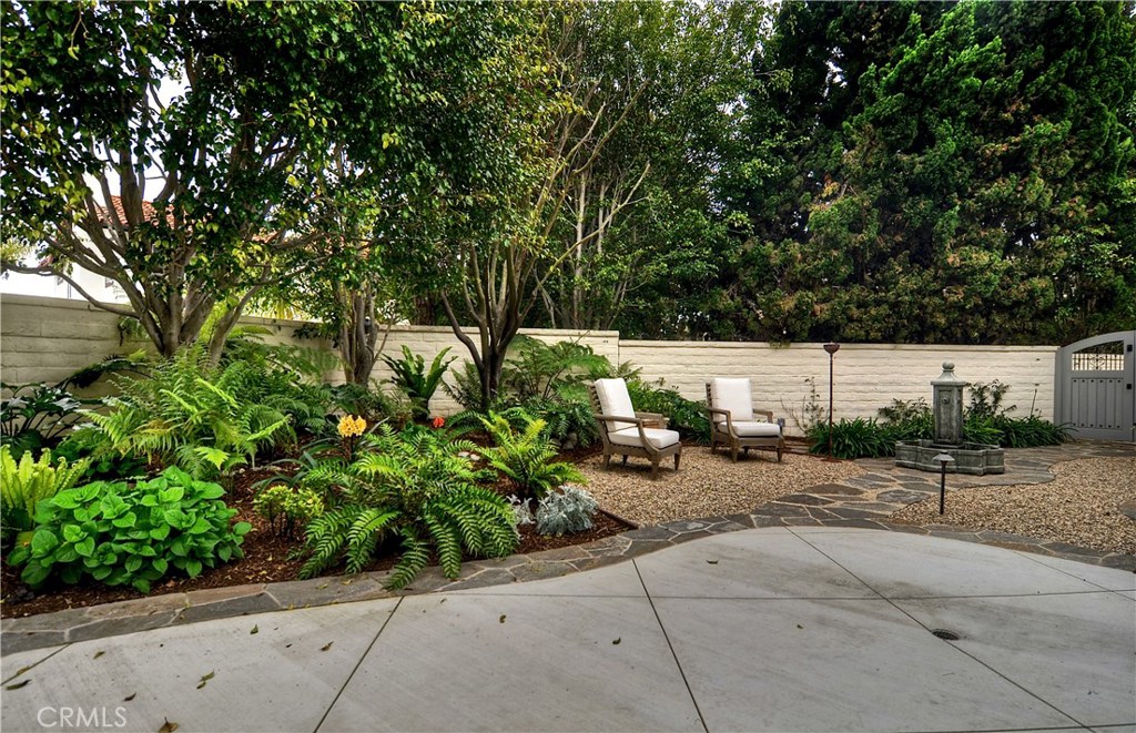 16 Via Adelia San Clemente, CA 92672 - Photo 24 of 42 a row of palm trees in front of a building