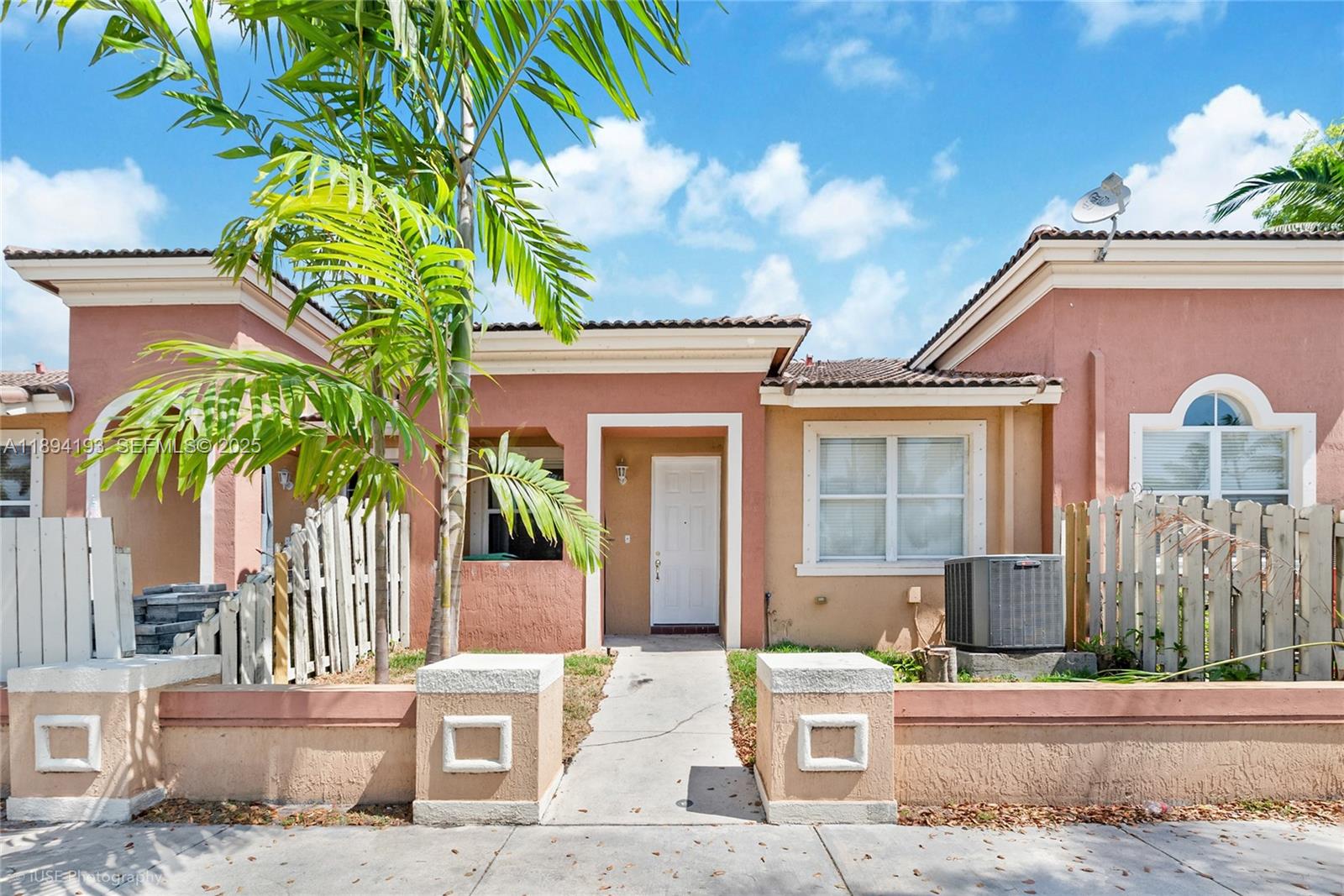 11084 Southwest 237th Lane Homestead, FL 33032 - Photo 12 of 12 front view of a house with a yard