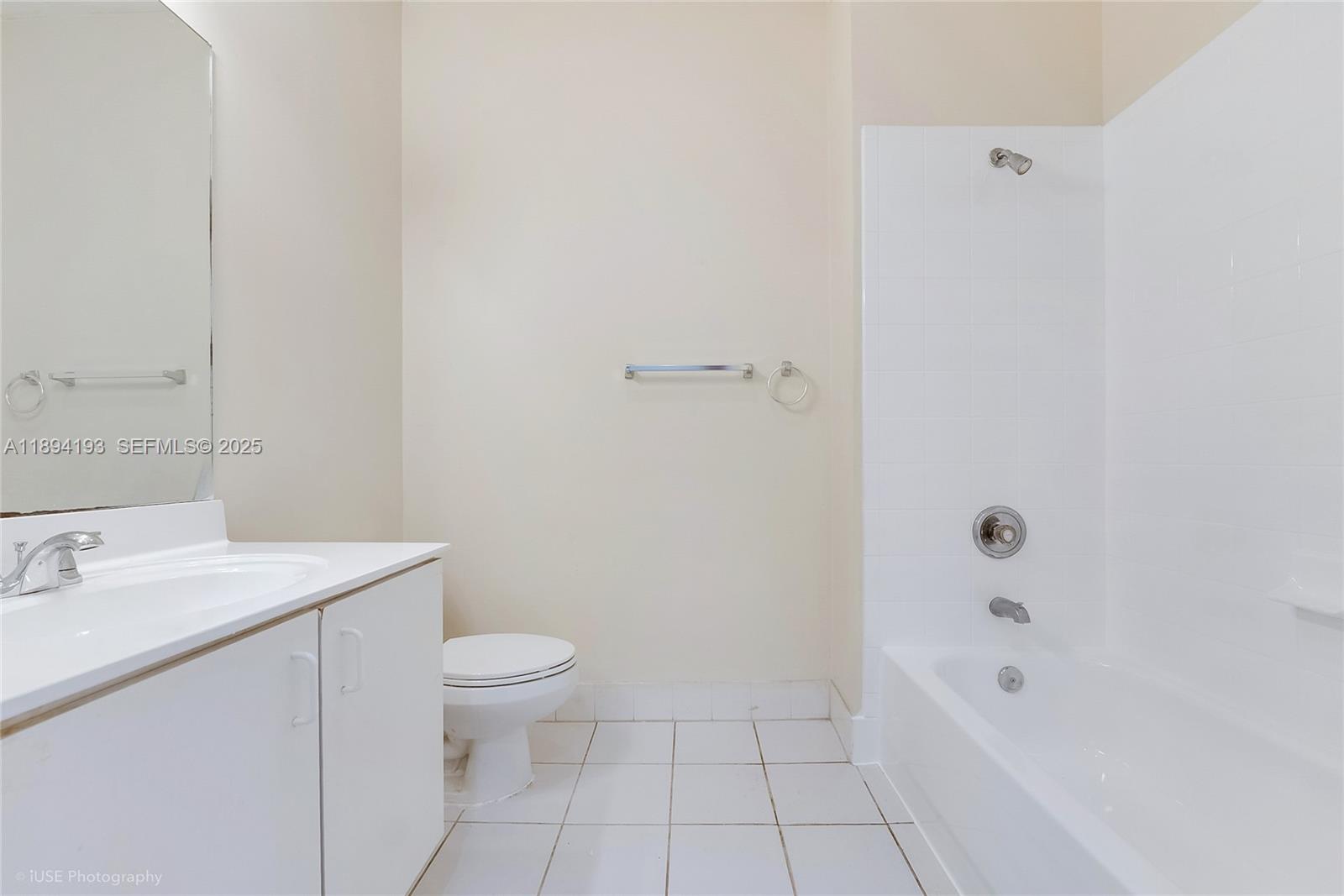 11084 Southwest 237th Lane Homestead, FL 33032 - Photo 6 of 12 a bathroom with a sink a toilet and shower