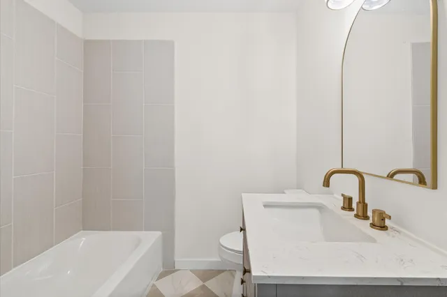 a bathroom with a sink and a tub