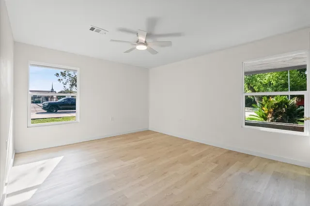 a view of an empty room and window