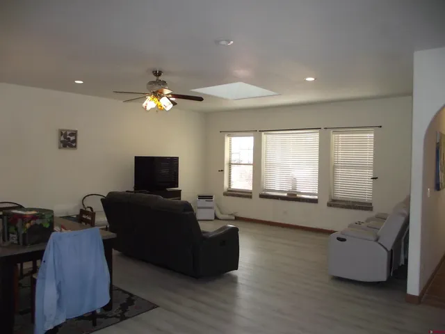 a room with furniture and wooden floor