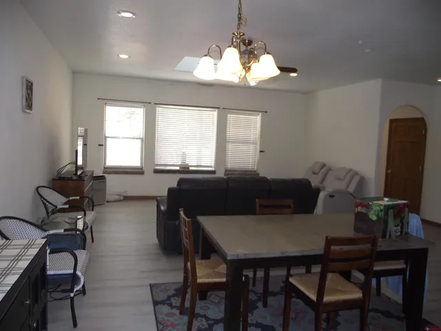 a view of a dining room with furniture