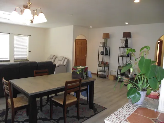 a kitchen with a sink stove and refrigerator