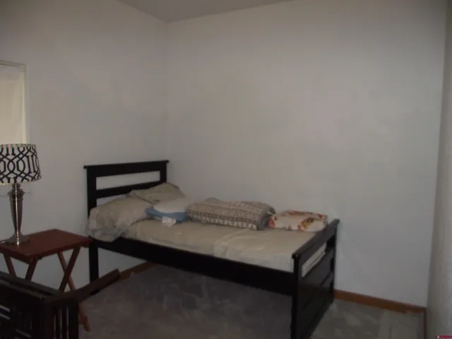 a view of a hallway with workspace