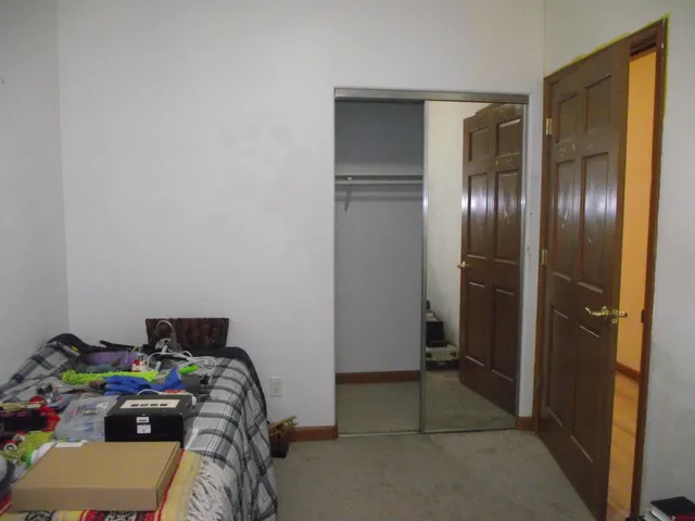 a view of a hallway with closet