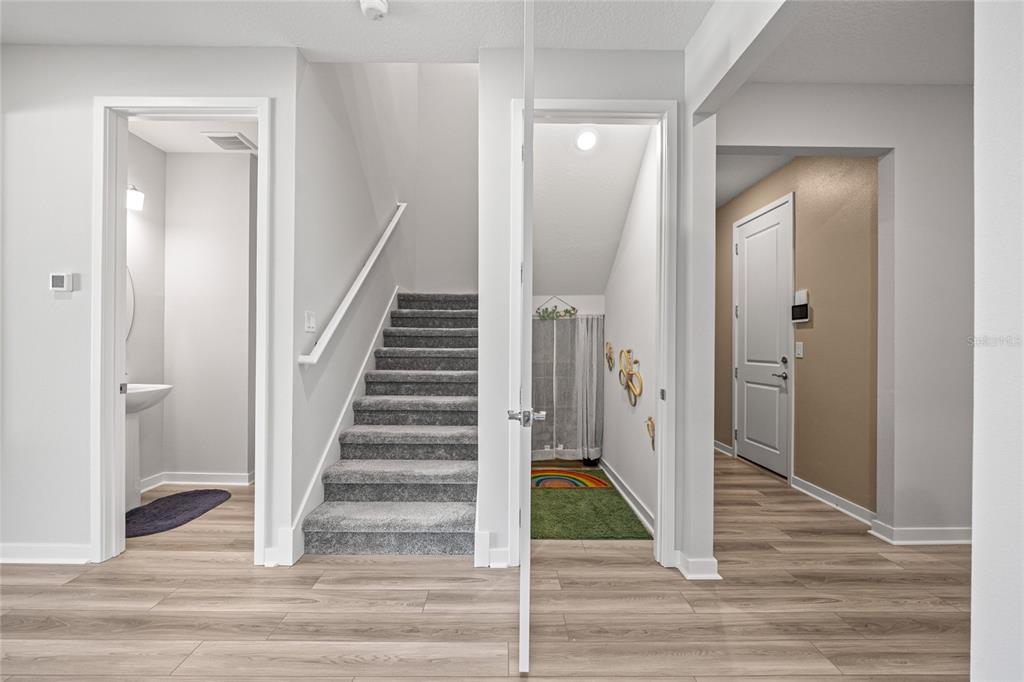 4472 Southwest 84th St Road Ocala, FL 34476 - Photo 11 of 50 a view of a hallway with wooden floor and entryway