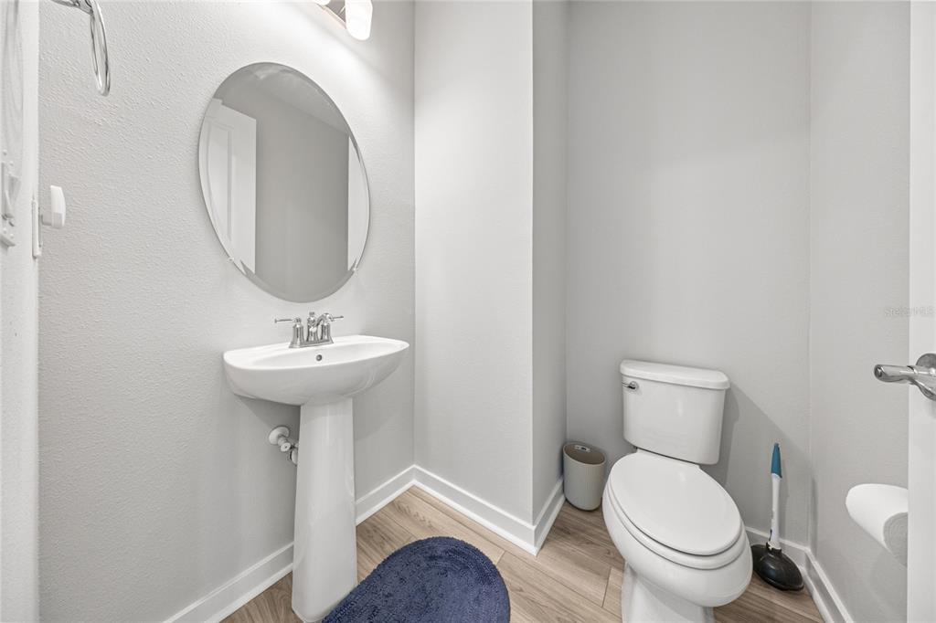 4472 Southwest 84th St Road Ocala, FL 34476 - Photo 13 of 50 a bathroom with a toilet sink and mirror