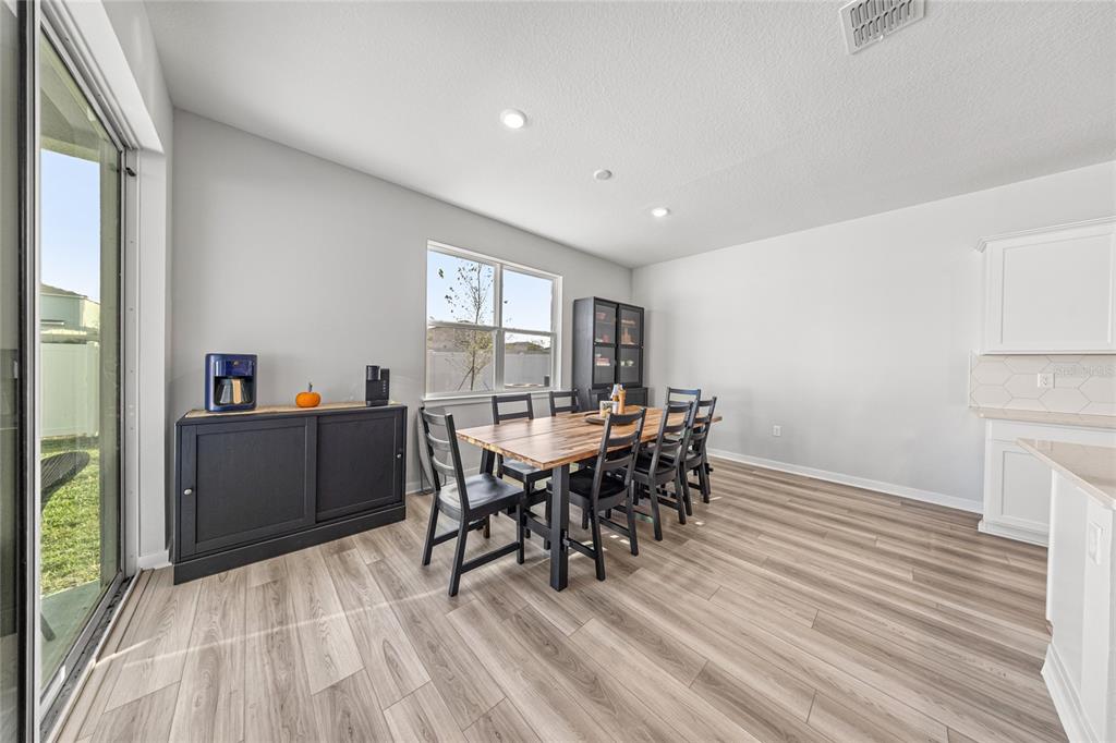 4472 Southwest 84th St Road Ocala, FL 34476 - Photo 20 of 50 a view of a dining room with furniture and window