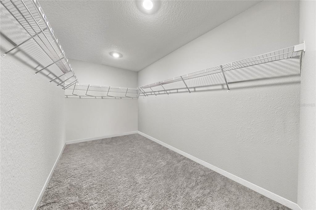 4472 Southwest 84th St Road Ocala, FL 34476 - Photo 30 of 50 a view of a room with racks on the wall