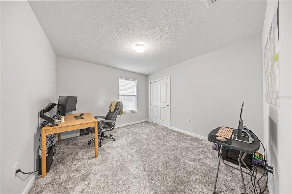 4472 Southwest 84th St Road Ocala, FL 34476 - Photo 33 of 50 a workspace with furniture and a window