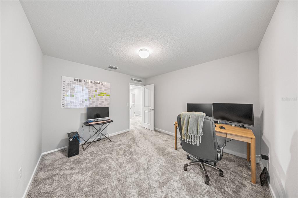 4472 Southwest 84th St Road Ocala, FL 34476 - Photo 34 of 50 a workspace with furniture and a window