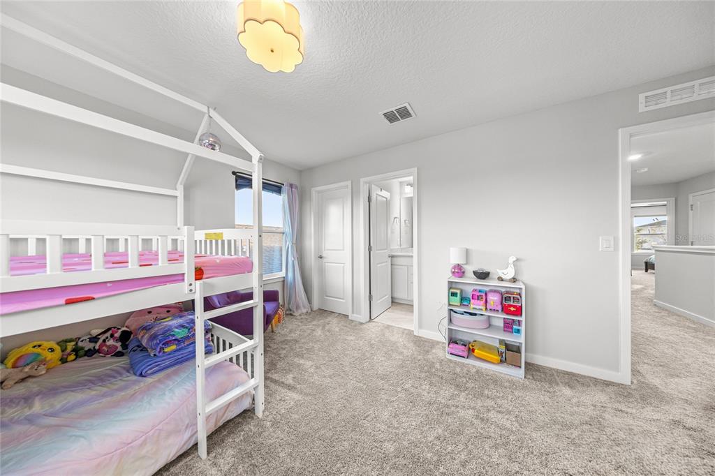 4472 Southwest 84th St Road Ocala, FL 34476 - Photo 36 of 50 a view of play room with toys and air hockey table